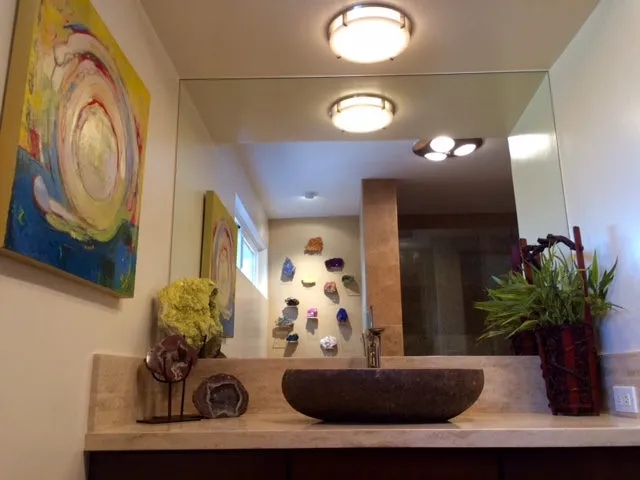 A Michele Zuzalek painting shown in a furnished room